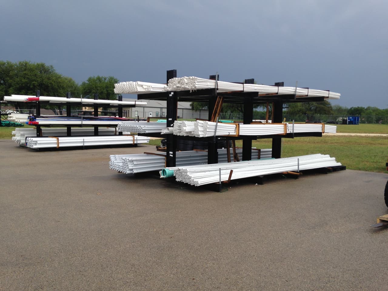 Outdoor racks of PVC pipe in the yard at Smith Supply in Stephenville, TX