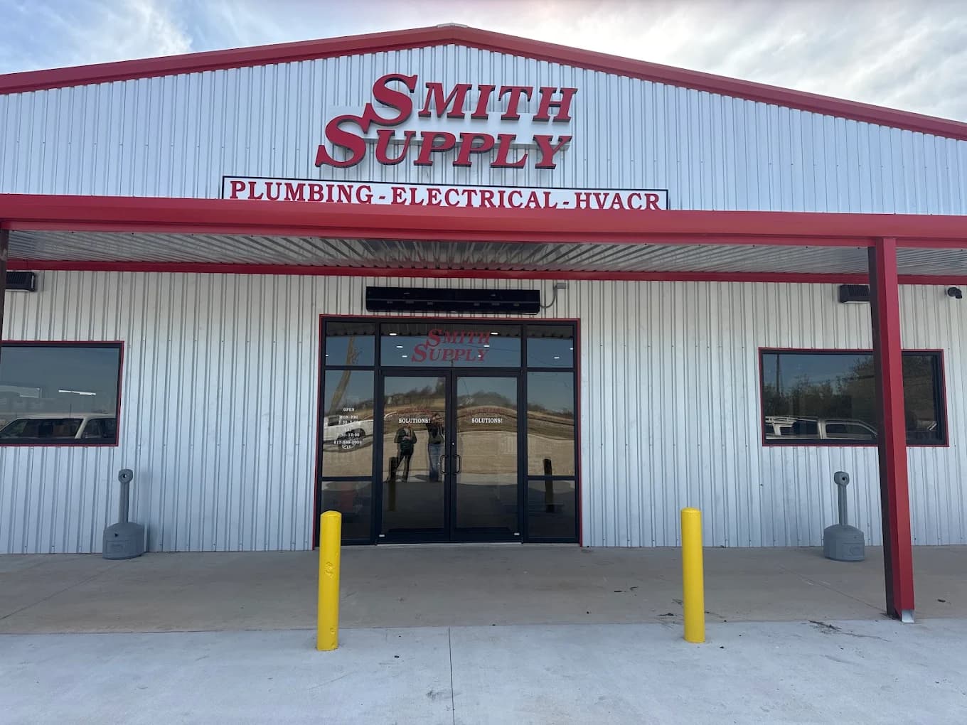 Smith Supply storefront with Plumbing, Electrical and HVACR sign at 7225 State Hwy 171 in Godley, TX